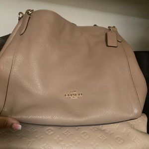 Tan coach handbag